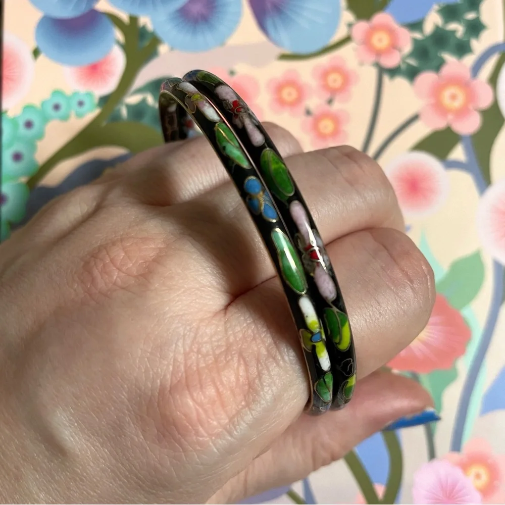 Two vintage cloisonné enamel bangle bracelets black w/ flowers & gold accents